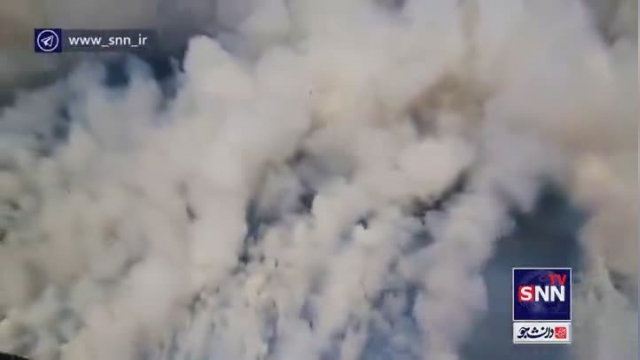 فیلم آتش سوزی گسترده در آلاسکا از نمای نمایی هوایی | آتش درحال گسترش است